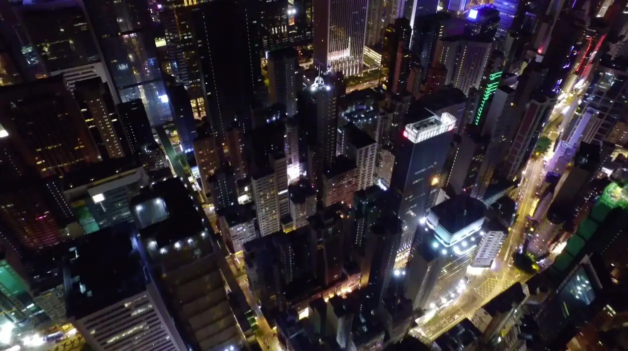俯瞰城市夜空 夜晚鸟瞰俯视繁华城市楼房高清视频素材 Aerial View Of City At Night