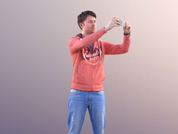 三维扫描写实人物用手机拍照片的外国男人