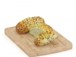 木板上的半个芝麻面包 bread